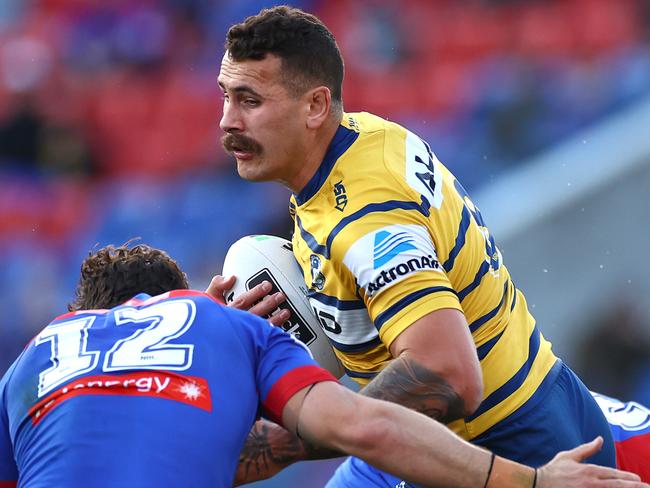 NEWCASTLE, AUSTRALIA - JULY 12: Reagan Campbell-Gillard of the Eels is tackled during the round nine NRL match between the Newcastle Knights and the Parramatta Eels at McDonald Jones Stadium on July 12, 2020 in Newcastle, Australia. (Photo by Cameron Spencer/Getty Images)