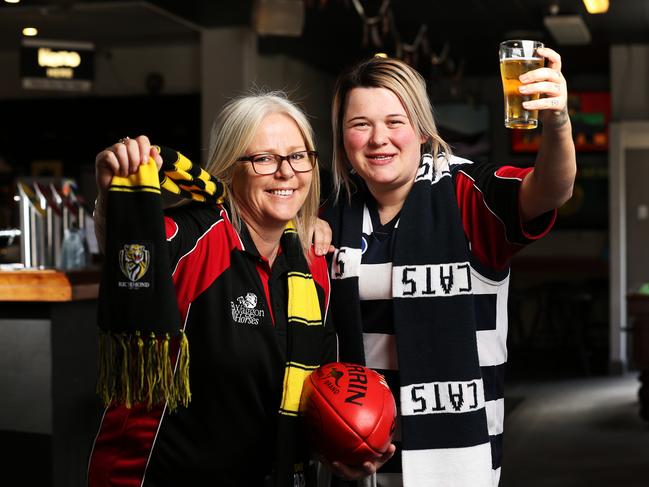 Ronnee Jury and Tamarah Davey from the Wagon & Horses Hotel are ready for Saturday's AFL grand final between the Richmond and Geelong.  Picture: Zak Simmonds