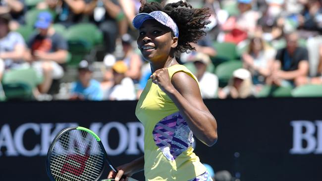 Venus Williams of the United States celebrates her win over Stefanie Voegele in round 2 of the Womens Singles on day three of the Australian Open in Melbourne, Australia, Wednesday, Jan. 18, 2017. (AAP Image/Tracey Nearmy) NO ARCHIVING, EDITORIAL USE ONLY