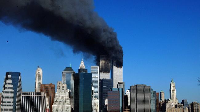 Smoke pours from the twin towers of the World Trade Center after they were struck by hijacked commercial airplanes in New York on September 11, 2001. Picture: File