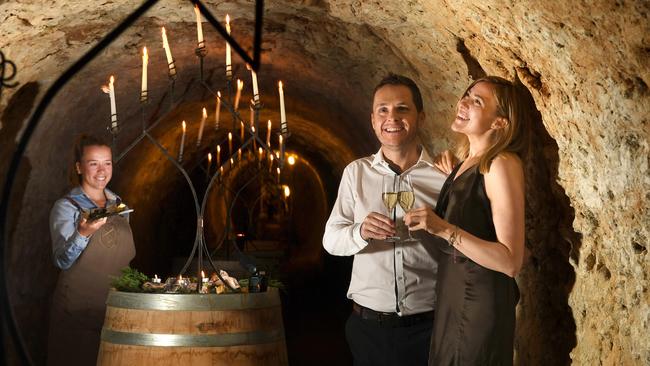 Maxwell Wines waitress Katie Whish serves canapes to Mark Guy and Nichole St Pierre in The Cave at Maxwell Wines. Picture: Tricia Watkinson