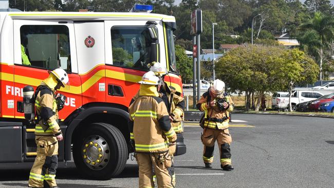 Emergency services responded to a bomb threat at Mt Pleasant Centre with customers and workers evacuated to the KFC car park. Picture: Lillian Watkins fire QFES generic