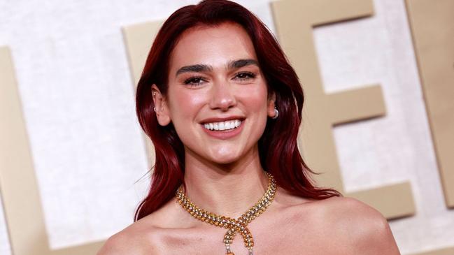 Albanian singer Dua Lipa arrives for the 81st annual Golden Globe Awards at The Beverly Hilton hotel in Beverly Hills, California, on January 7, 2024. (Photo by Michael TRAN / AFP)