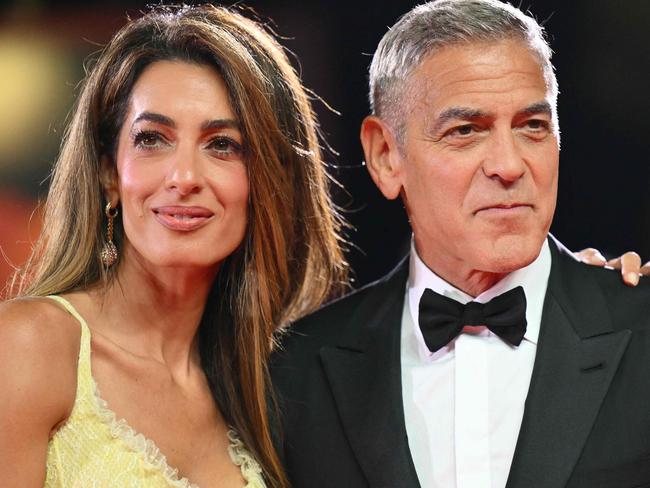 Actor George Clooney and his wife Amal Clooney attend the red carpet of the movie 