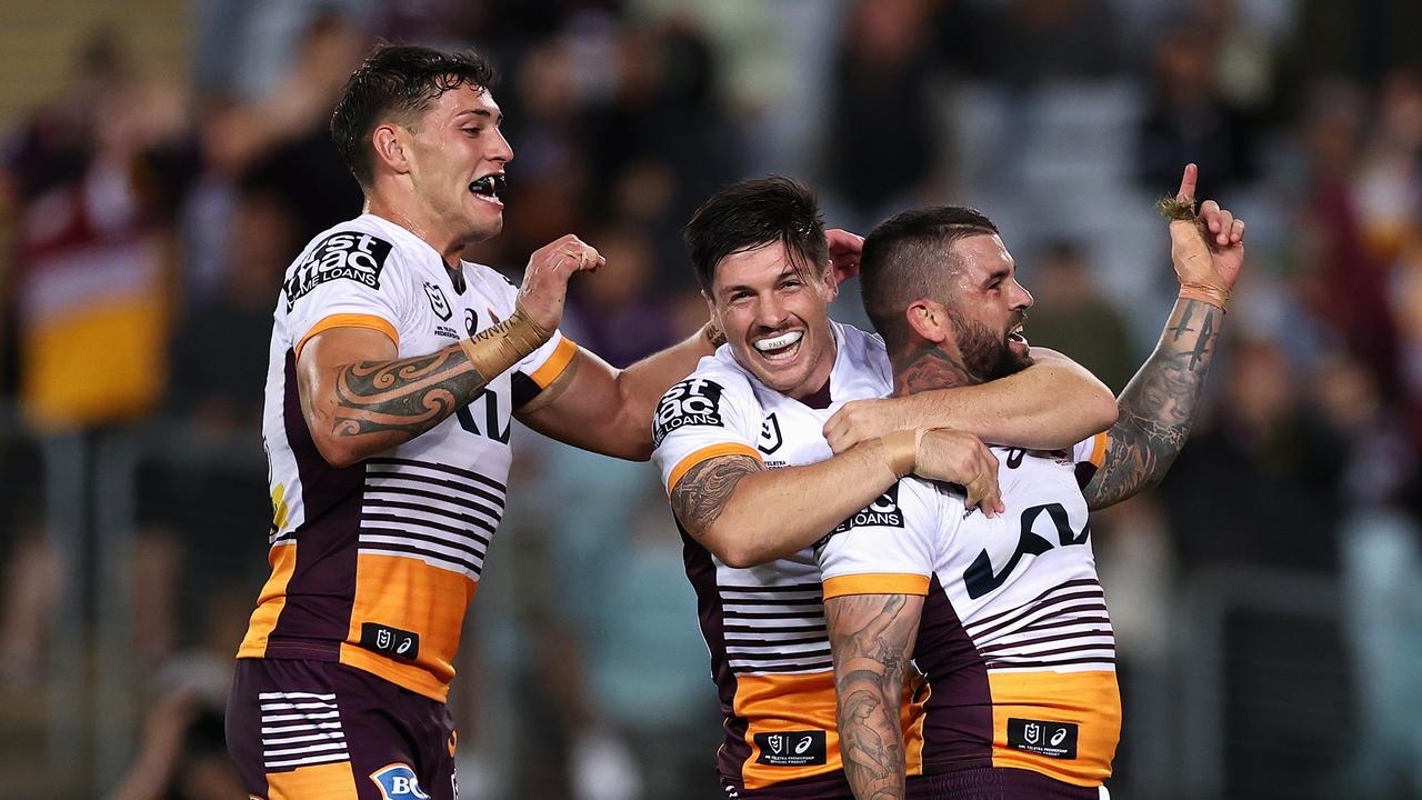 SYDNEY, AUSTRALIA - MAY 05: Adam Reynolds of the Broncos celebrates scoring a try during the round nine NRL match between the South Sydney Rabbitohs and the Brisbane Broncos at Accor Stadium, on May 05, 2022, in Sydney, Australia. (Photo by Cameron Spencer/Getty Images)