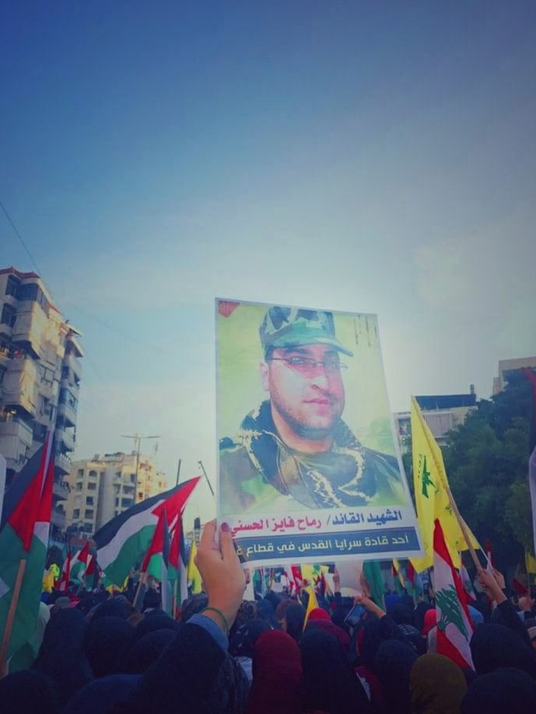 Remah Fayez Al-Hasani is the deceased son of Palestinian artist Fayez Elhasani. This picture shared in 2017 by a relative on Facebook shows his image being held up at a protest in Beirut, Lebanon. Picture: Supplied/Facebook