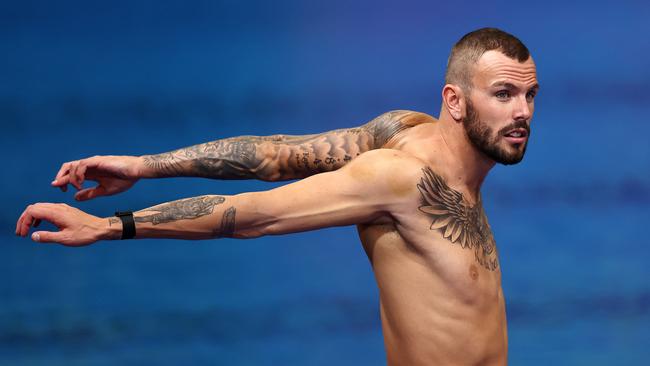 Australian swimmer Kyle Chalmers warms up before a training session in Birmingham. Picture Michael Klein