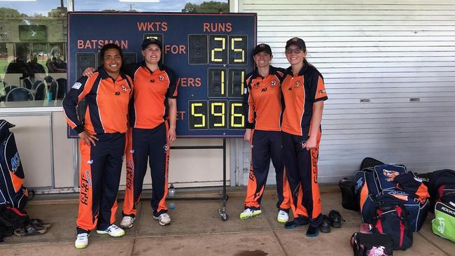 Century-makers Tabitha Saville, Samantha Betts, Tegan McPharlin and Darcie Brown in front of Northern Districts’ Australian record 50-over score, 3/596, made against Port Adelaide in October. Picture: Supplied