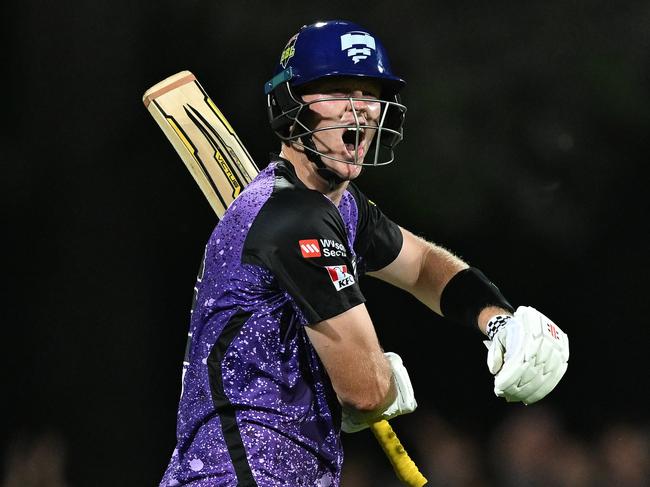 HOBART, AUSTRALIA - JANUARY 27: Mitch Owen of the Hurricanes celebrates scoring a century during the BBL The Final match between Hobart Hurricanes and Sydney Thunder at Ninja Stadium on January 27, 2025 in Hobart, Australia. (Photo by Steve Bell/Getty Images)