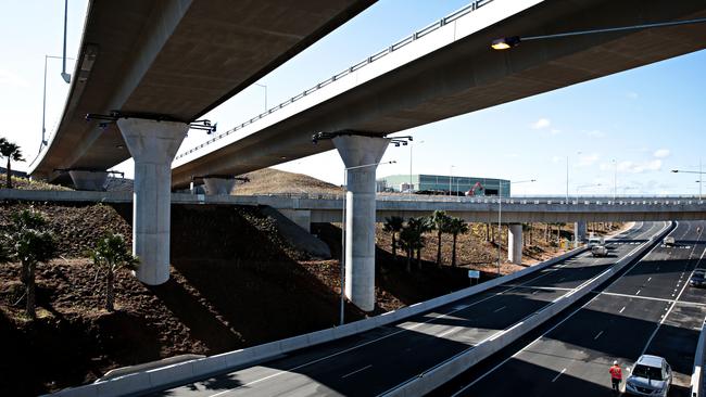 The prospect of higher global interest rates would make the values of toll road projects and Sydney Airport look less attractive in the short term. Picture: Adam Yip