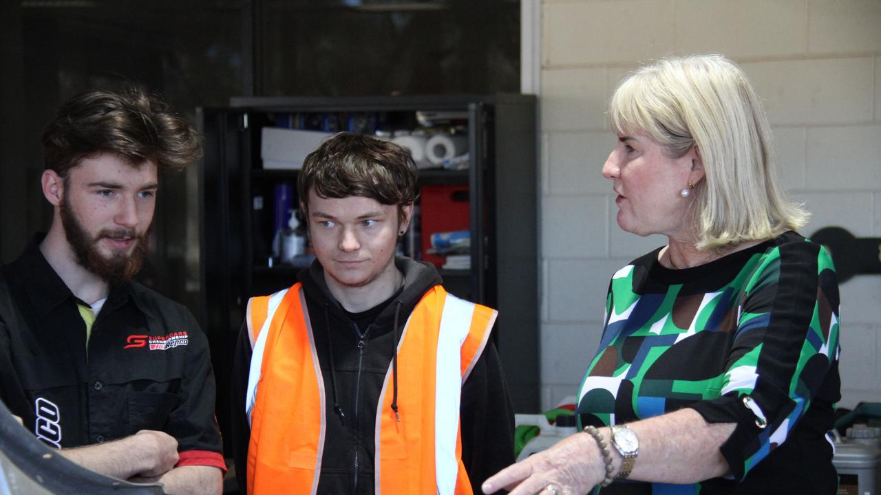 Oliver Phelps from Centralian senior college talks cars with Northern Territory Chief Minister Eva Lawler in Alice Springs. Picture: Gera Kazakov