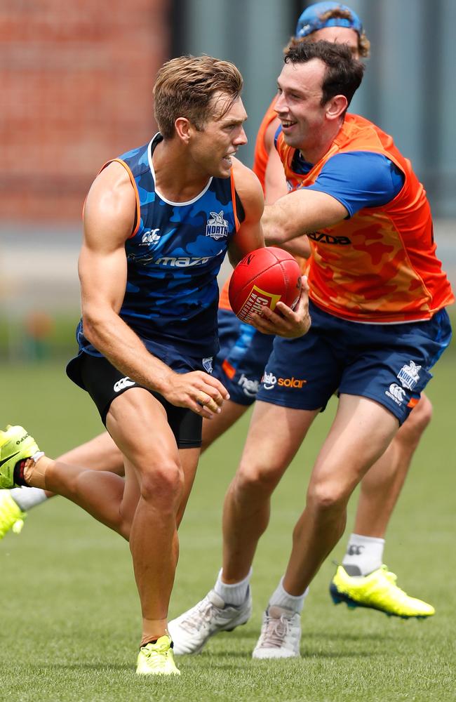 Shaun Higgins evades Todd Goldstein in Kangaroos match simulation. Picture: Getty