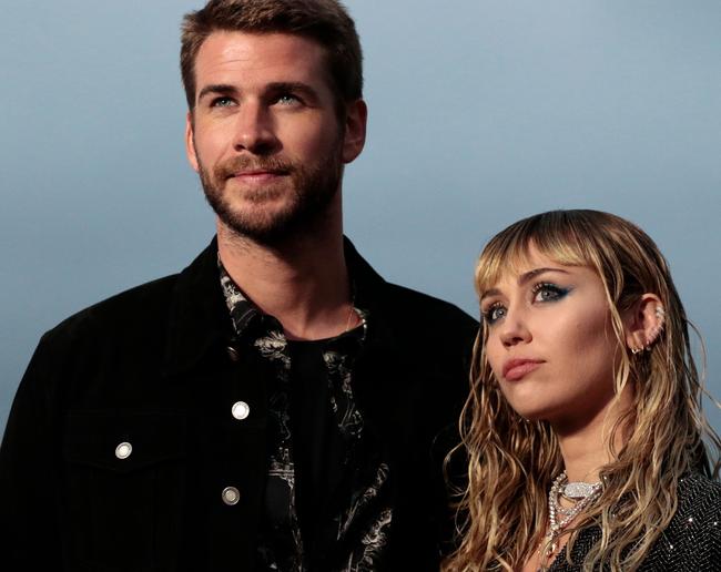 Liam Hemsworth and Miley Cyrus in the weeks before their short-lived marriage imploded. Picture: AFP