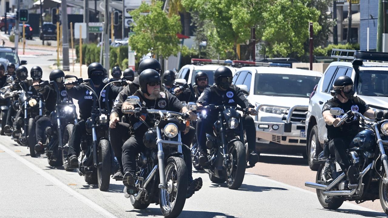 Mourners arrive at the funeral home in North Perth.