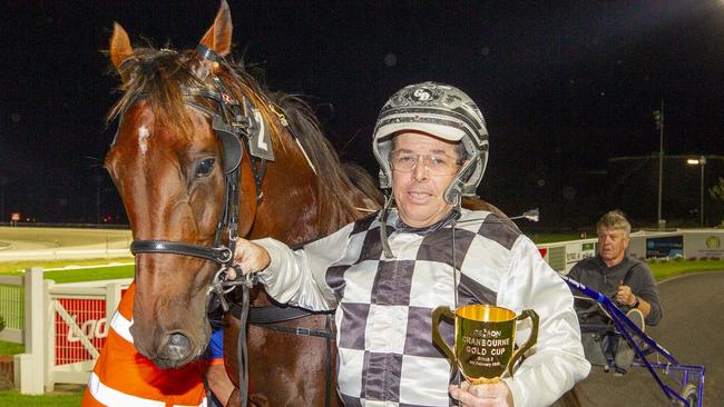 Trainer-driver Grant Dixon with Leap To Fame after the champ’s Cranbourne Gold Cup win earlier this year. Picture: Stuart McCormick