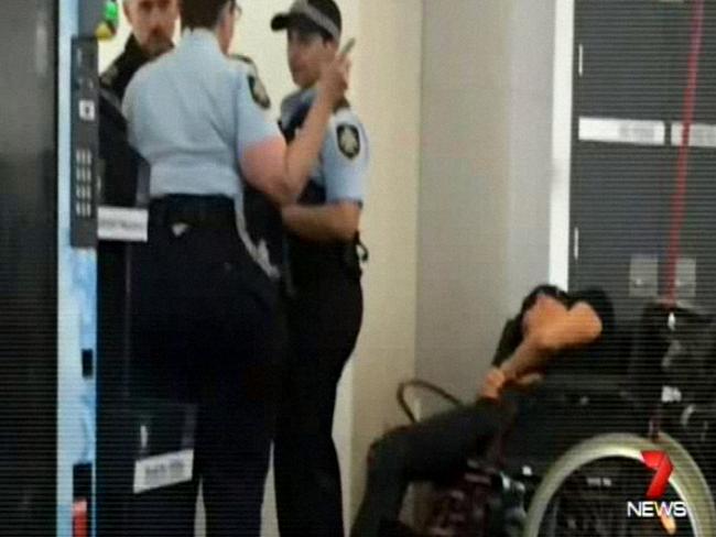 A man reported to be Grant Hackett slumped in a wheelchair. Picture: Channel 7