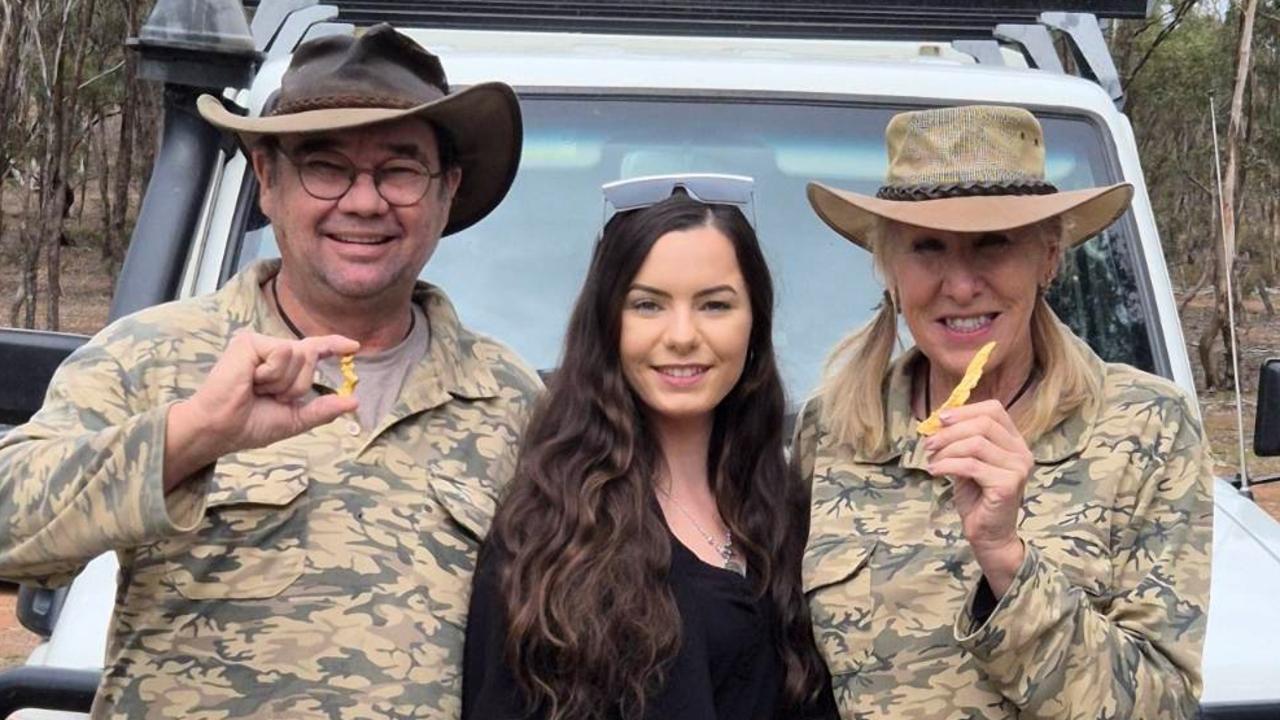 Gold Gypsies Chris and Greg Clark with Wedderburn real estate agent Kat McKay (middle), showing off some of the gold pieces they’ve found.