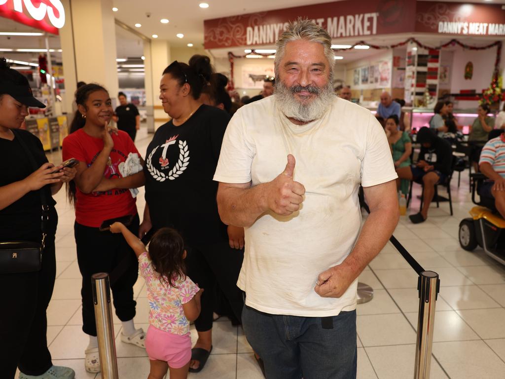 Hundreds of shoppers like Rick (pictured) waited in line to get their hands on a gift card. Picture: Rohan Kelly.