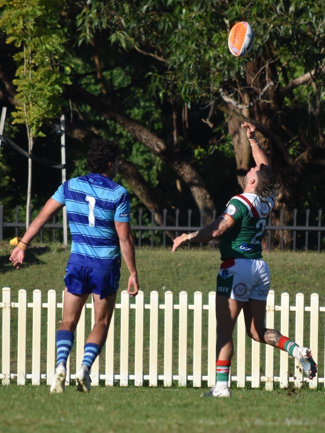 Samuel Stratis tries to regather the ball as Tali Toetu'u watches. Picture: Sean Teuma/NewsLocal.