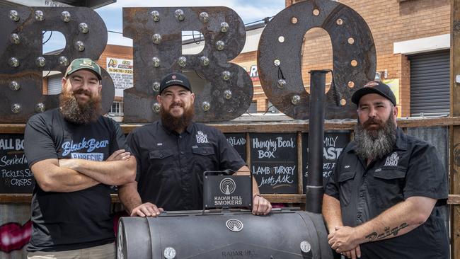 Ben Huppatz, Glen Ellis and Scott McCoy cook up a mean barbie. Picture: Monique Harmer