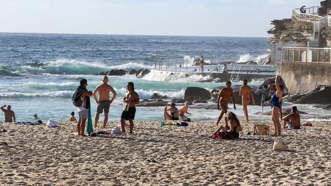 Swimmers returned to the beach on Monday as the search continued. Picture: NCA NewsWire / Gaye Gerard