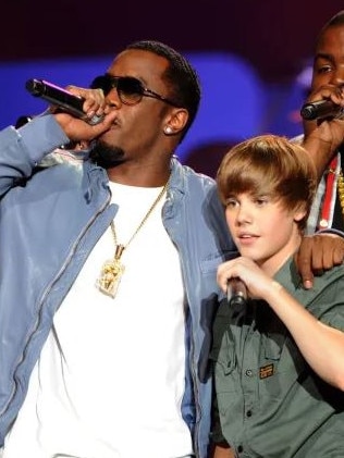 Diddy with a young Justin Bieber. There is no suggestion the former child star is involved. Picture: Getty Images