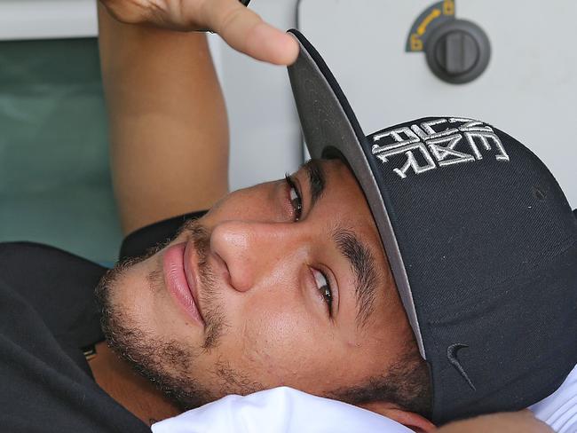 Handout picture released by the Brazilian football Confederation (CBF) of Brazil's star Neymar flashing the V sign before his departure to his home in Guaruya, at Granja Comary training center in Teresopolis, Rio de Janeiro state, Brazil, on July 5, 2014. Injured Brazil star Neymar departed his team's training base in Terespolis in a helicopter on Saturday and headed home to Sao Paulo, after his World Cup ended in agony on Friday night. AFP PHOTO/RICARDO STUCKERT-CBF-CBF-NEWS- RESTRICTED TO EDITORIAL USE - MANDATORY CREDIT "AFP PHOTO/CBF-TV/HO" - NO MARKETING NO ADVERTISING CAMPAIGNS - DISTRIBUTED AS A SERVICE TO CLIENTS