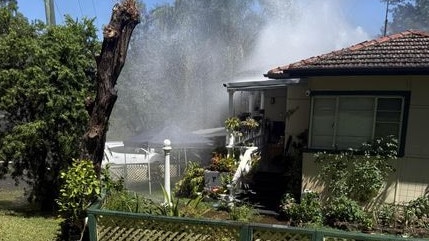 The pipe burst behind the property and spilt into the backyard. Picture: Facebook