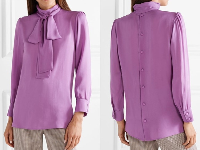 The $1495 Gucci blouse is designed to be worn with the buttons down the back. Picture: Net-a-Porter