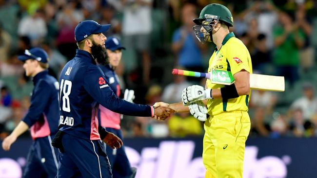 Moeen Ali and Andrew Tye shake hands after the fourth ODI. Picture: AAP