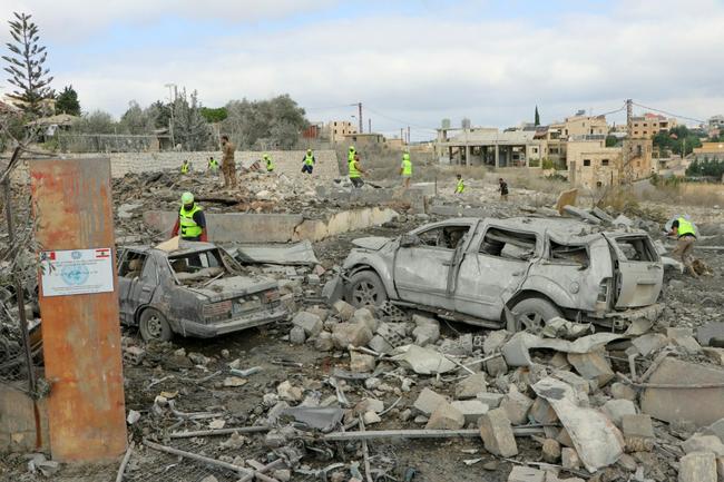 Rescuers search for survivors at the site of an overnight Israeli airstrike that targeted the southern Lebanese village of Derdghaiya on October 10, 2024.