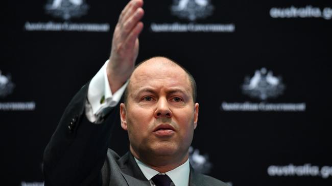 Treasurer Josh Frydenberg is weaning workers and businesses off JobKeeper. Photo: Sam Mooy/Getty Images