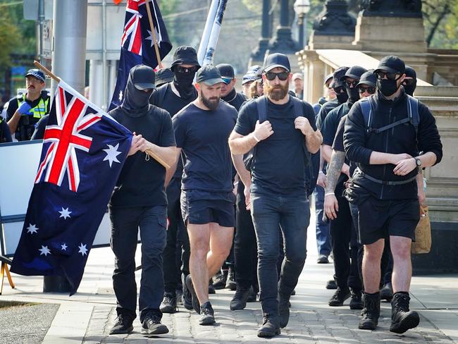 MELBOURNE AUSTRALIA - NewsWire Photos September 23, 2023: A group of neo-nazi sympathisers try to join the No to the Voice protestors  during a rally in Melbourne.Picture: NCA NewsWire / Luis Enrique Ascui