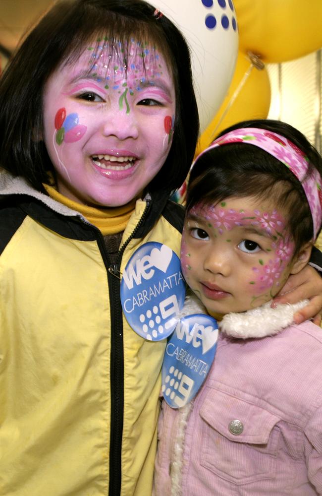 Mary Le, 5, and her sister Kathy Le, 3, at the Cabramatta Moon Festival.