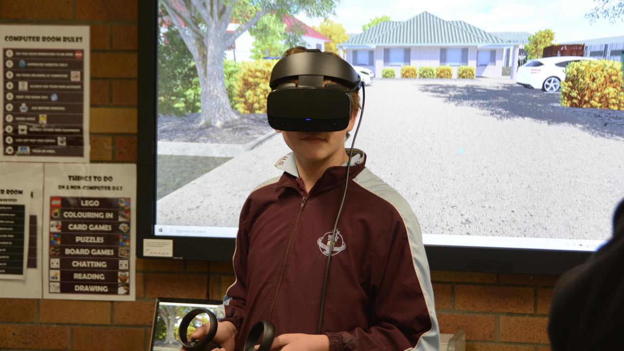 Oakey State High School student Wayne Gemmell using the virtual reality learning hub.