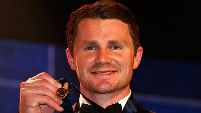 MELBOURNE, AUSTRALIA — SEPTEMBER 26: Patrick Dangerfield of the Cats holds the 2016 Brownlow Medal during the 2016 Brownlow Medal Count at the Crown Palladium on September 26, 2016 in Melbourne, Australia. (Photo by Adam Trafford/AFL Media/Getty Images)