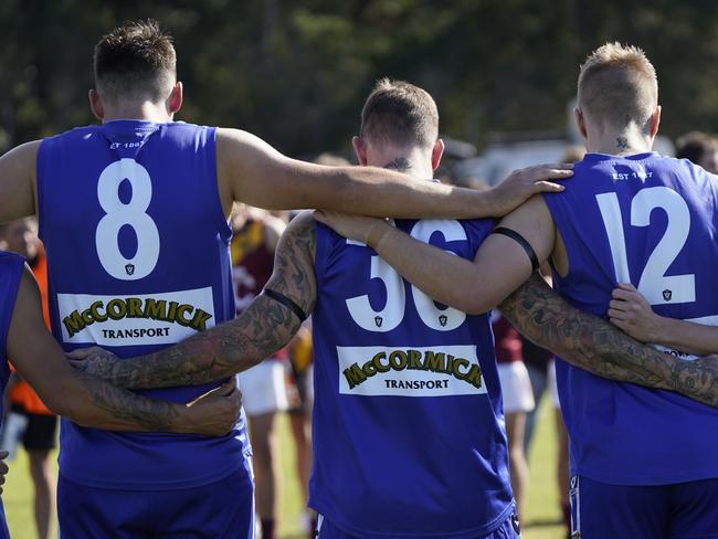 Dane Swan with Hastings teammates Ben King (left) and Brayde Bosman (right). Picture: Valeriu Campan