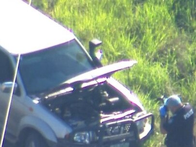 Police are searching for the driver of a car who fled the scene of a horrific crash involving a motorbike south of Brisbane. Picture: 7 News