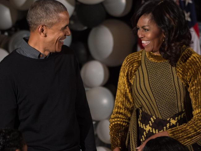 US President Barack Obama and First Lady Michelle Obama have thrown their support behind Hillary Clinton. Picture: AFP/NICHOLAS KAMM