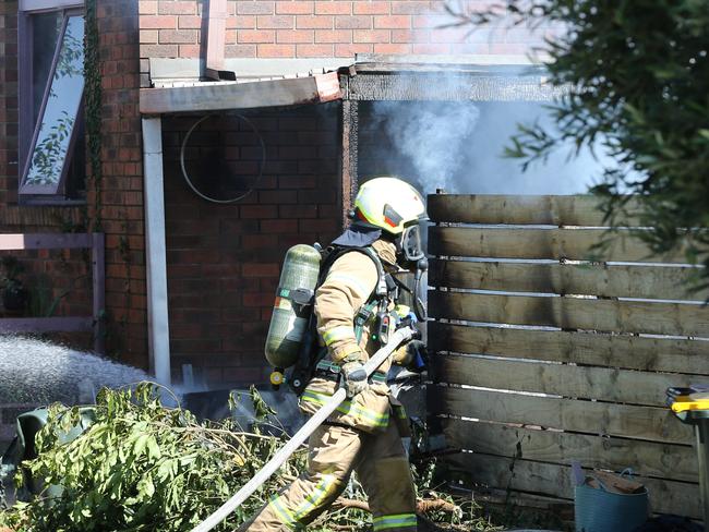 Fire crews worked to extinguish a carport fire at 351  Pakington St, Newtown. Picture: Peter Ristevski