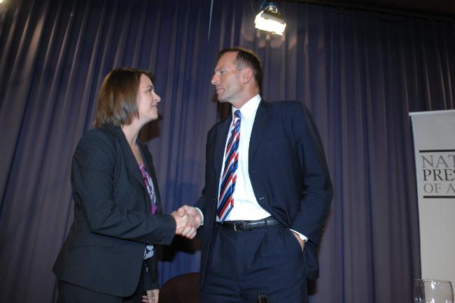 <p>Tony Abbott shakes hands with Nicola Roxon after the 2007 health debate he was criticised for being late to. Picture: Kym Smith</p>