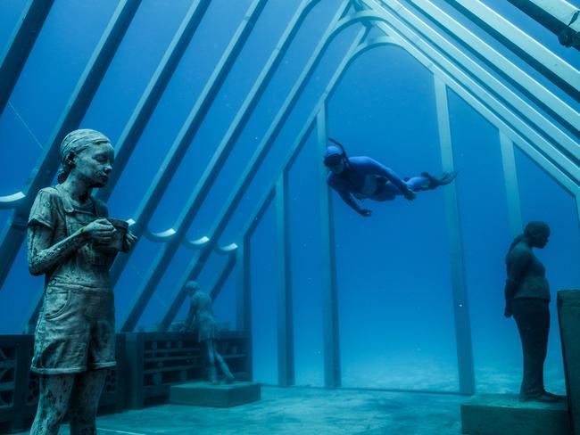 The instalment depicts people in a greenhouse, but rather than plants and flowers, coral will grow in their place. Pictures: Jason deCaires