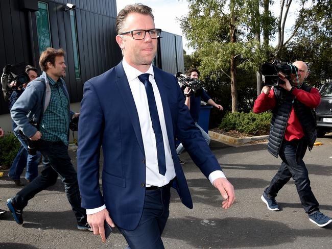 Unhappy. Glenn Archer leaves court. Picture: Nicole Garmston