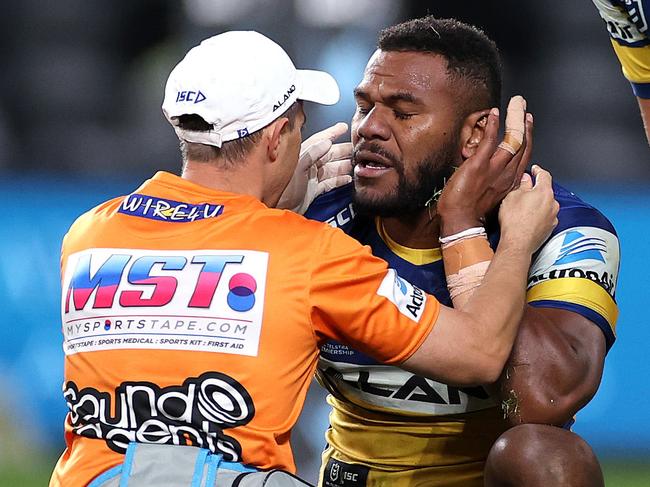 Parramatta's Maika Sivo is attended to after being tackled during the NRL match between the Parramatta Eels and Melbourne Storm at Bankwest Stadium. Picture. Phil Hillyard