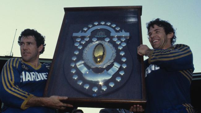 Steve Edge and Mick Cronin with the silverware.