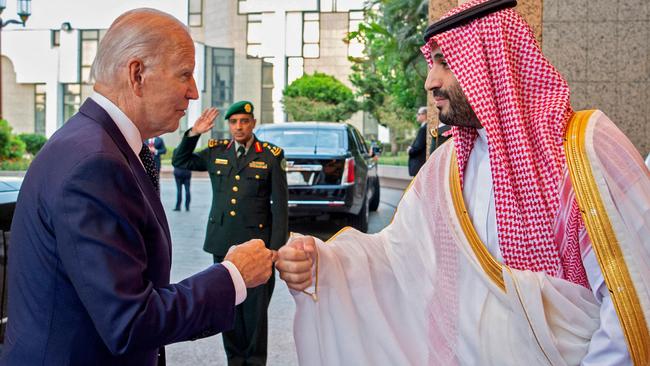 Saudi Crown Prince Mohammed bin Salman (R) bumps fists with Joe Biden at Al-Salam Palace in Jeddah. Picture: AFP.