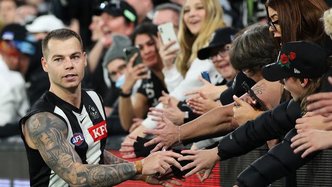 Jamie Elliot soaks it all up in the post-match celebrations. Picture: Mark Stewart