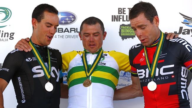 Winner Simon Gerrans nearly falls of the podium with Cadel Evans and Richie Porte. Picture: Michael Klein.