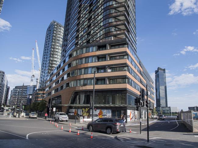 Police at the Tom Thumb Lane apartment building in Docklands. Picture: Jason Edwards