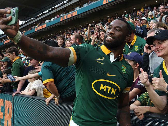 BRISBANE, AUSTRALIA - AUGUST 10: Siya Kolisi (captain) of Springboks takes a photo with his fans after The Rugby Championship match between Australia Wallabies and South Africa Springboks at Suncorp Stadium on August 10, 2024 in Brisbane, Australia. (Photo by Regi Varghese/Getty Images)